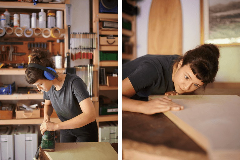 Femme ponçant une planche de bois avec une ponceuse dans un atelier