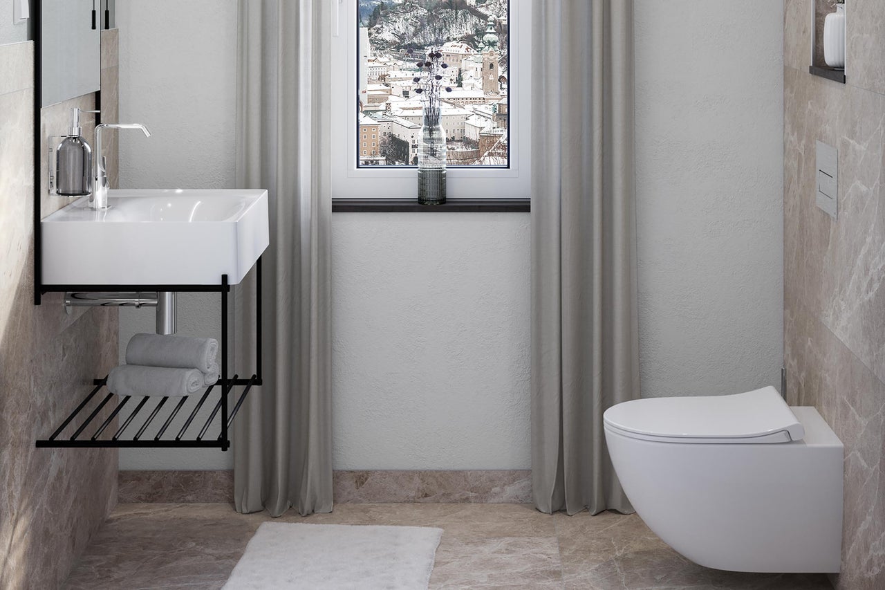 Salle de bain moderne avec lavabo, toilettes et fenêtre