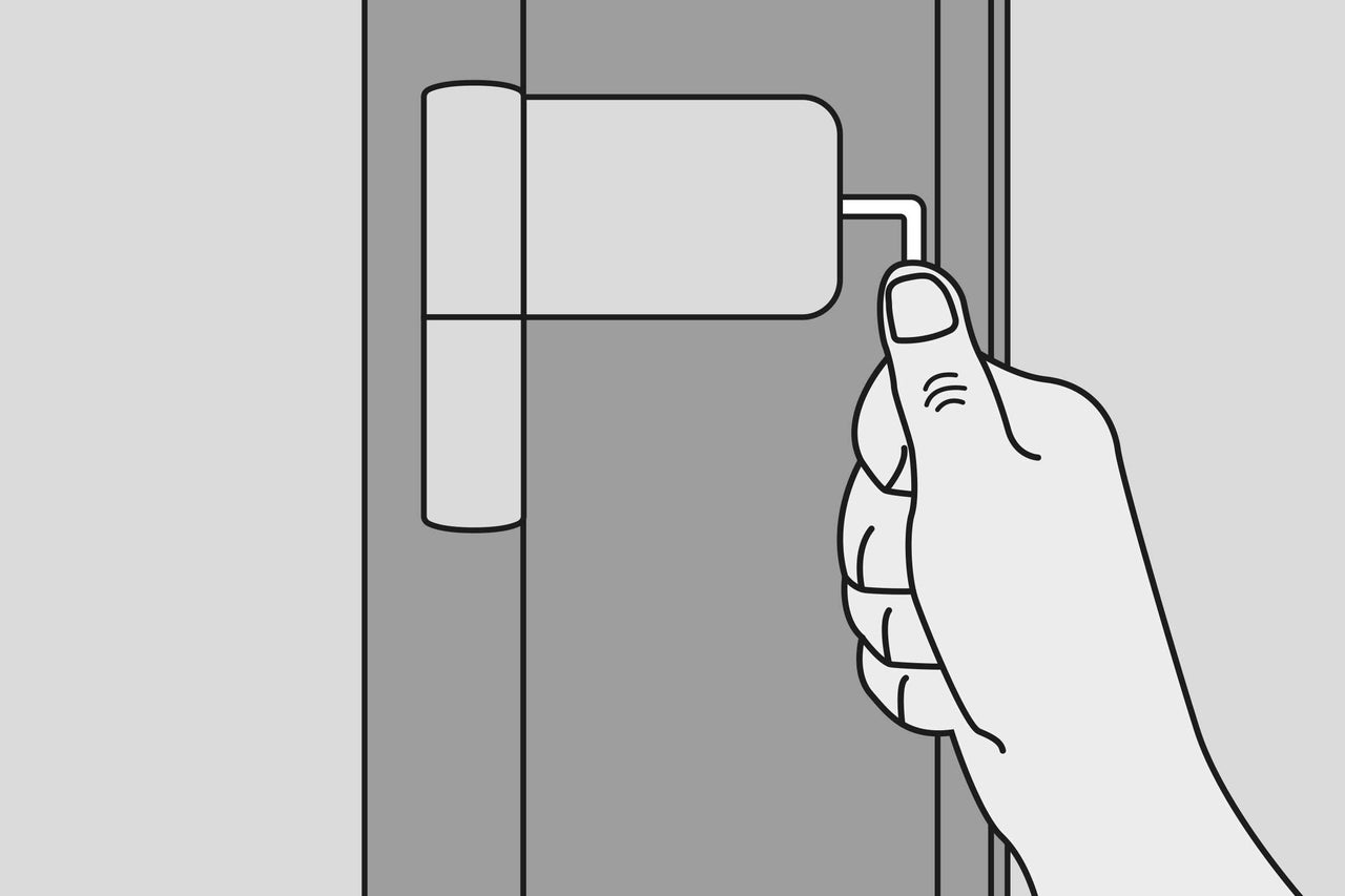 Illustration d'une main actionnant une poignée de fenêtre
