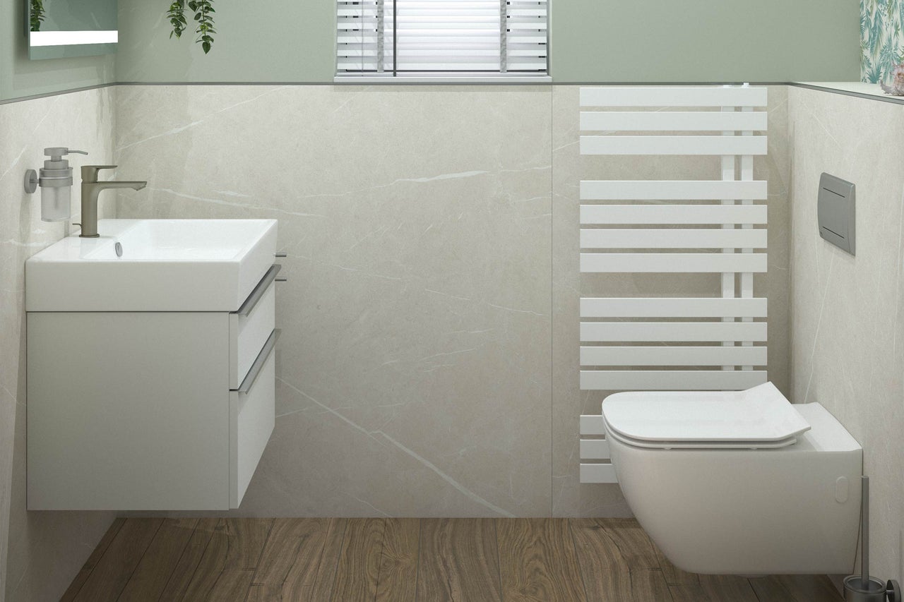 Salle de bains moderne avec meuble sous-lavabo, sèche-serviettes et WC suspendu