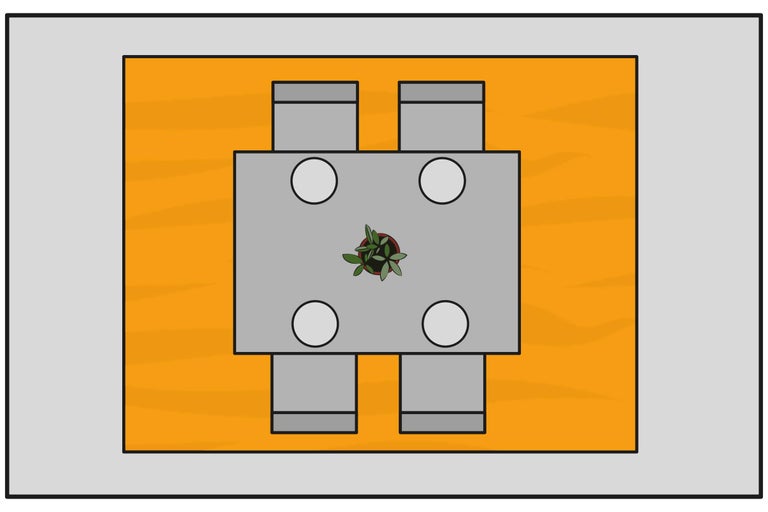 Vue de dessus d'une salle à manger avec table, chaises, vaisselle et plante