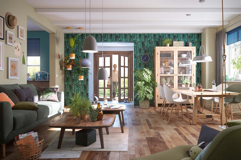 Salon avec canapé, table basse, table à manger et articles de décoration dans une maison