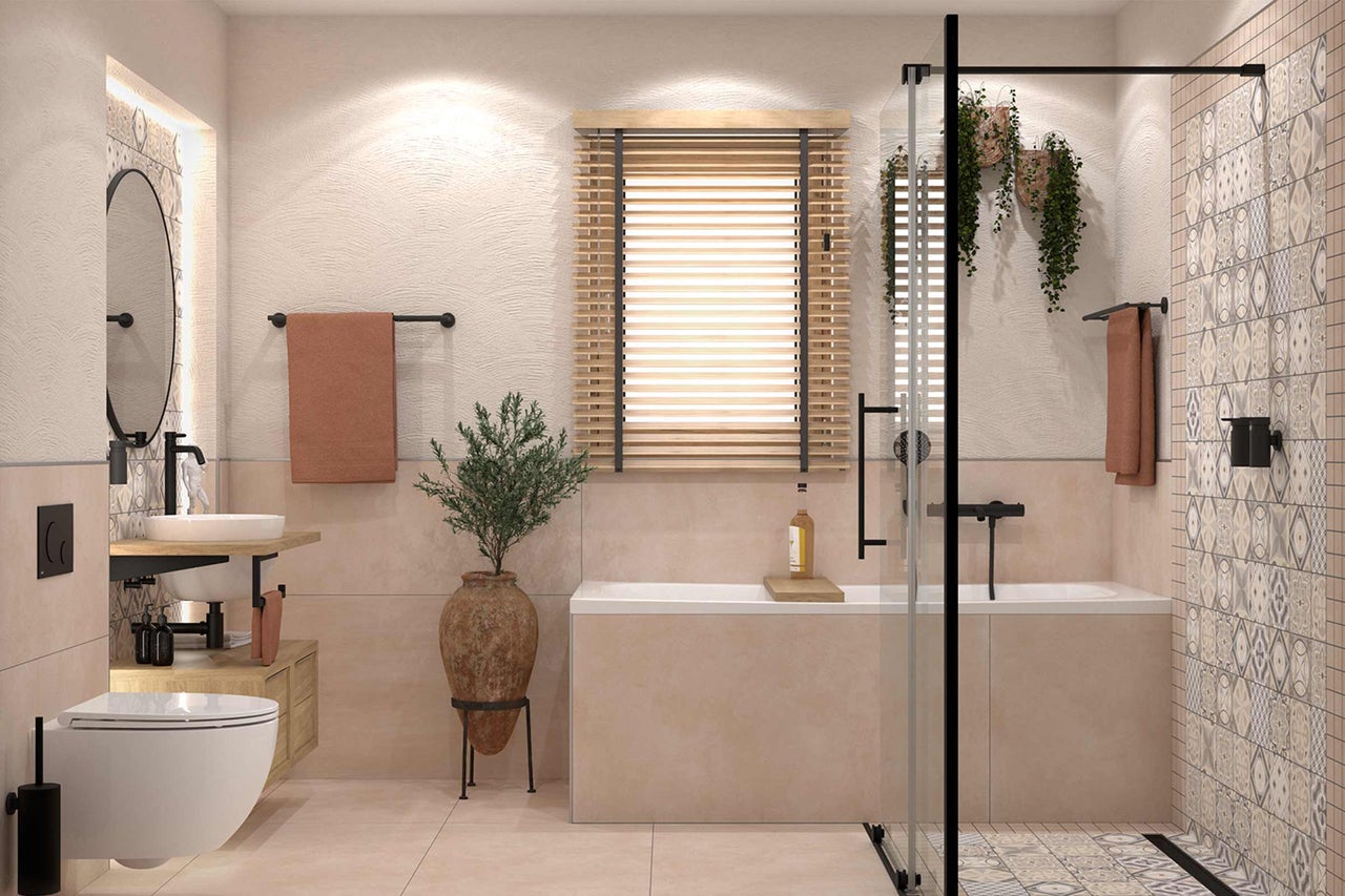 Salle de bains lumineuse avec lavabo, miroir, toilettes, baignoire et décorations pour une atmosphère conviviale