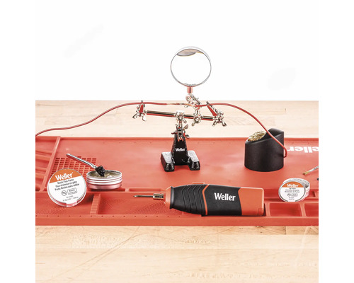 Station de soudure avec accessoires de soudure et logo Weller
