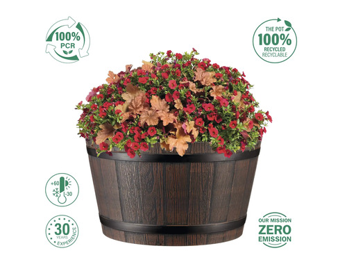 Blumenkübel mit roter Bepflanzung und Holzoptik