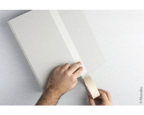 Recouvrement avec du ruban adhésif