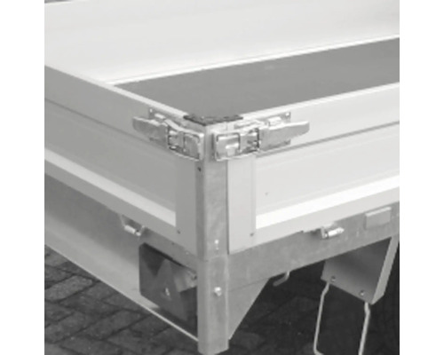 Vue détaillée d''une remorque avec surface de chargement et mécanisme de fermeture