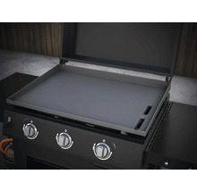 Grill avec plaque de cuisson et boutons de commande