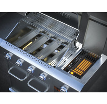 Gril à gaz en acier inoxydable avec couvercle ouvert et grilles