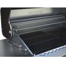 Innenansicht eines Tenneker Grills mit Grillrost und Warmhalterost