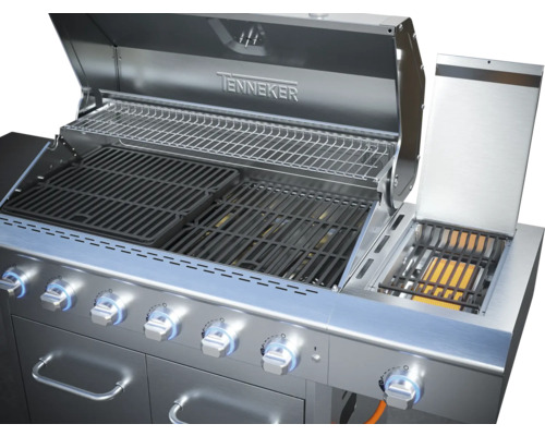 Edelstahl Gasgrill mit geöffnetem Deckel und Grillrost