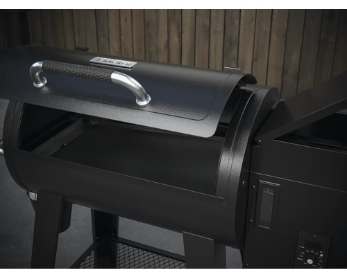 Tenneker Holzkohlegrill mit teilweise geöffnetem Deckel