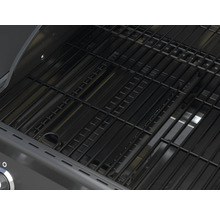 Gros plan d''un barbecue à gaz avec une grille.