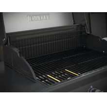 Vue intérieure d''un barbecue Tenneker avec grille de cuisson et grille de maintien au chaud