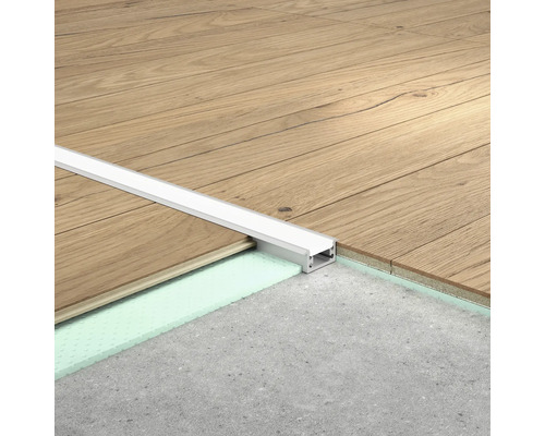 Profilé de transition entre plancher en bois et sol en béton