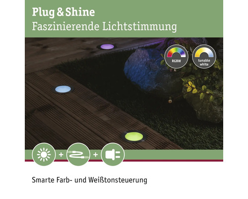 Spots encastrables au sol avec différentes couleurs pour l''éclairage du jardin.