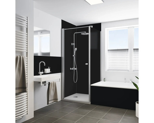 Modernes Badezimmer mit Duschkabine, Waschbecken und Handtuchwärmer für ein stilvolles Ambiente.