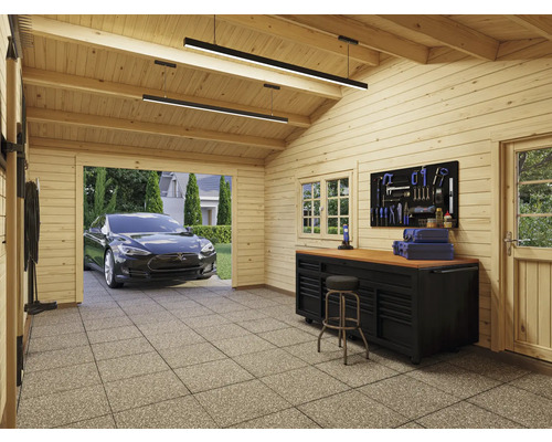 Garage avec établi, mur d''outils, tabouret et voiture