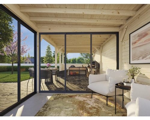 Cabane en bois clair avec coin salon et vue sur le jardin