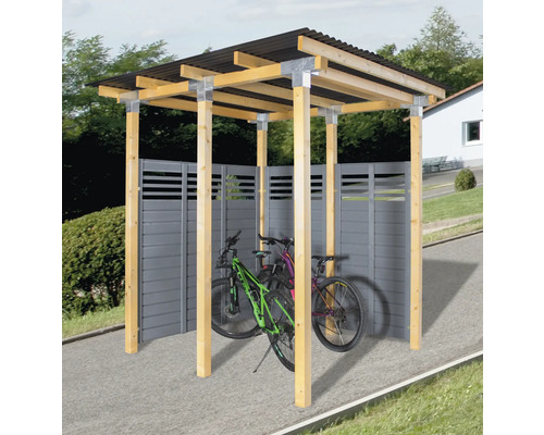 Abri à vélos avec poutres en bois, parois arrière et deux vélos