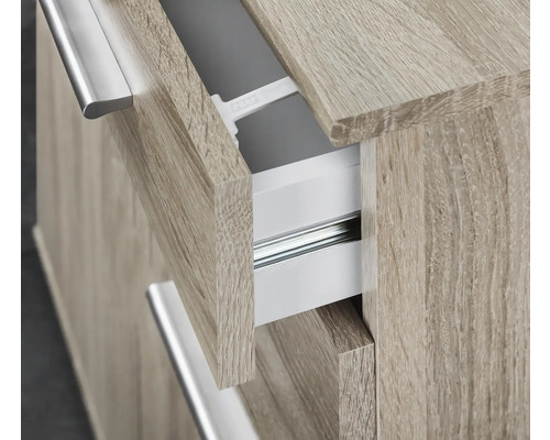 Vue détaillée d''une armoire avec tiroir ouvert et poignée en métal