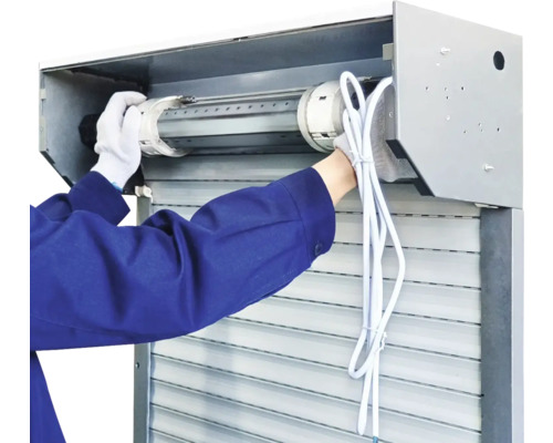 Installation d''un moteur de volet roulant dans un caisson de volet roulant