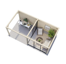 Überblick eines Gartenhauses mit Grillbereich und Sitzecke