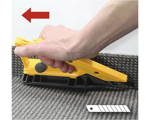 Coupe-tapis en cours d''utilisation sur moquette