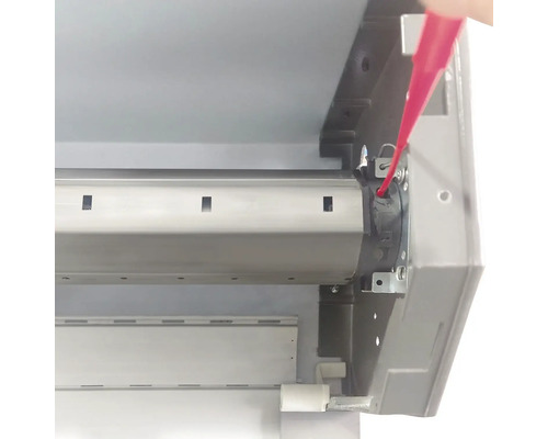 Mécanisme de store avec outil rouge pour la réparation