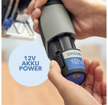 Batterie Dremel 12 volts tenue par des mains