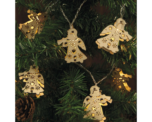 Guirlande lumineuse avec motifs d''anges en bois sur un sapin de Noël