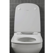 Abattant de WC blanc avec couvercle de Duravit, légèrement ouvert
