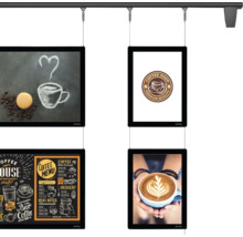 Système de présentation suspendu avec quatre écrans rétroéclairés présentant des motifs de café