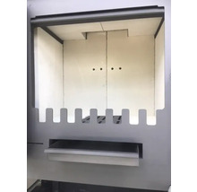 Innenansicht eines Kaminofens mit Brennkammer und Ascheschublade