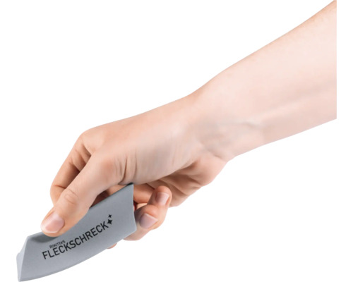 Hand hält Fleckenentferner