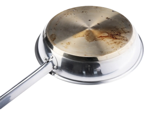 Edelstahl-Schöpfkelle mit Gebrauchsspuren