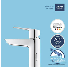 Glänzender Wasserhahn mit Grohe Logo, Hinweis auf Herstellung in Deutschland, sechs Jahre Garantie und inklusivem QuickTool