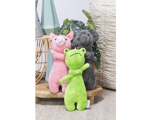 Plüschfigurenset mit Schwein, Koala und Frosch auf einem Tisch