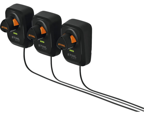 Trois chargeurs Stihl ALS 31 alignés