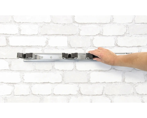 Support mural pour manches avec main