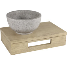 Vasque à poser grise en pierre sur un meuble sous-vasque en bois