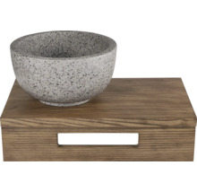 Bol décoratif en pierre sur une boîte en bois