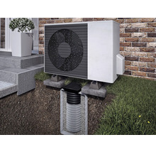 Außenwärmepumpe mit versickerungsfähigem Sickerschacht zur Regenwasserableitung