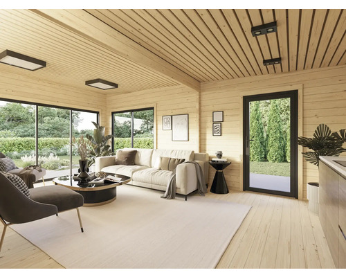 Salon avec lambris, canapé, fauteuils, tapis et fenêtres