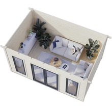 Vue intérieure d'un abri de jardin avec meubles et fenêtres