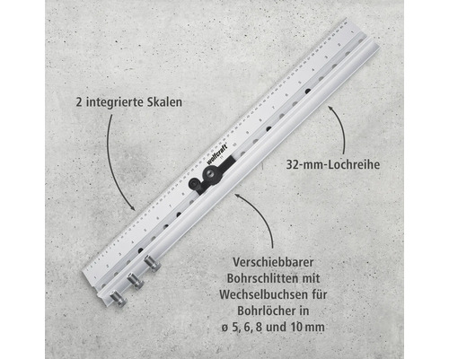 Wolfcraft Bohrlehre mit zwei integrierten Skalen, einer 32 Millimeter Lochreihe und verschiebbarem Bohrschlitten für Bohrlöcher mit 5, 6, 8 und 10 Millimeter Durchmesser.