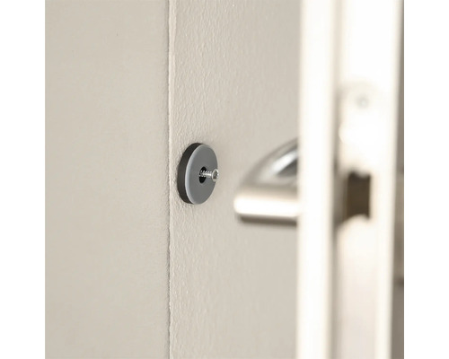 Graue Türpuffer an der Wand montiert