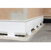 Wärmedämmung mit Perimeterdämmplatten an einer Hauswand