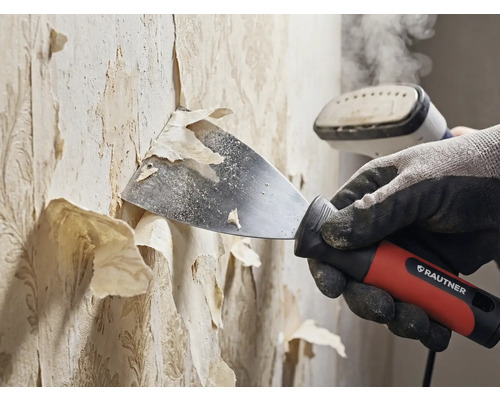 Enlèvement de papier peint avec spatule et appareil à vapeur