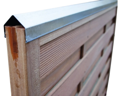 Gros plan d'une clôture en bois avec couvercle métallique